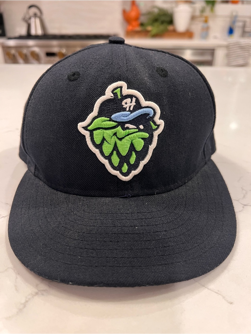HOPS New Era Black Kids Baseball Hat with Green & Blue Patch